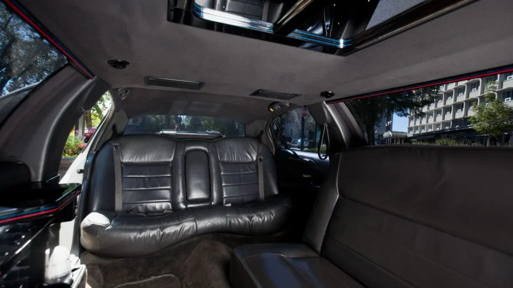 A car with leather seats and black walls